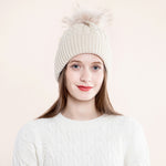 Load image into Gallery viewer, Knitted cable wool ball cap acrylic flanging warm woolen cap
