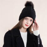 Load image into Gallery viewer, Knitted cable wool ball cap acrylic flanging warm woolen cap
